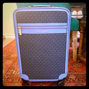 MK carry on roller suitcase